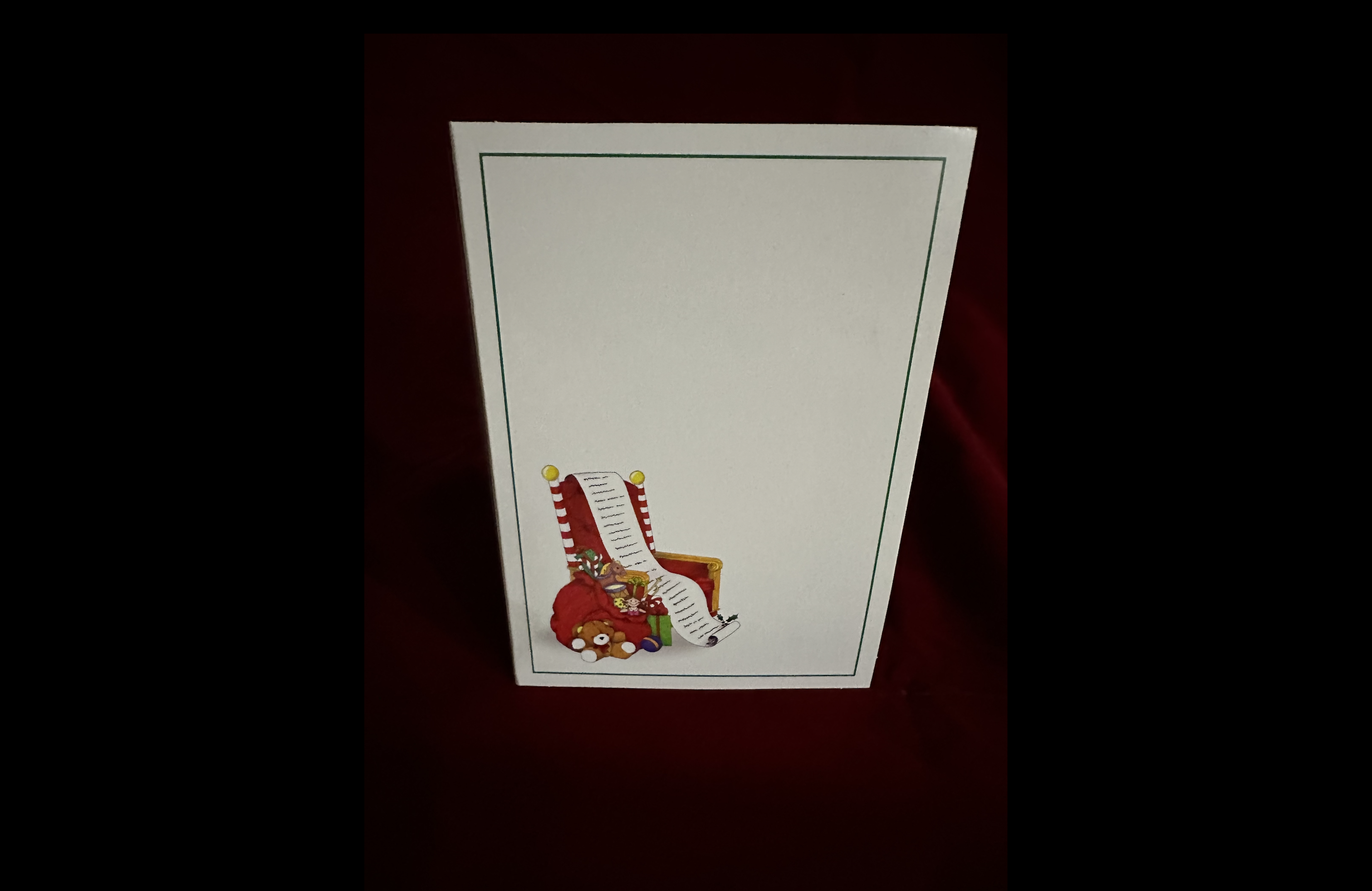 Standard white folio with a Santa Claus throne picture..