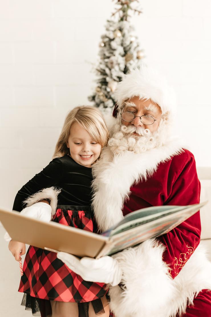 Mr. Claus reading 'Twas the Night Before Christmas'.